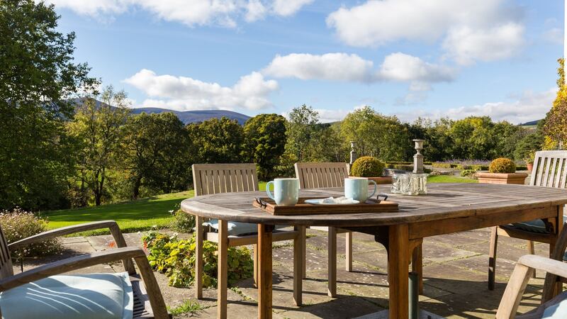 There are extensive terraces surrounding the house