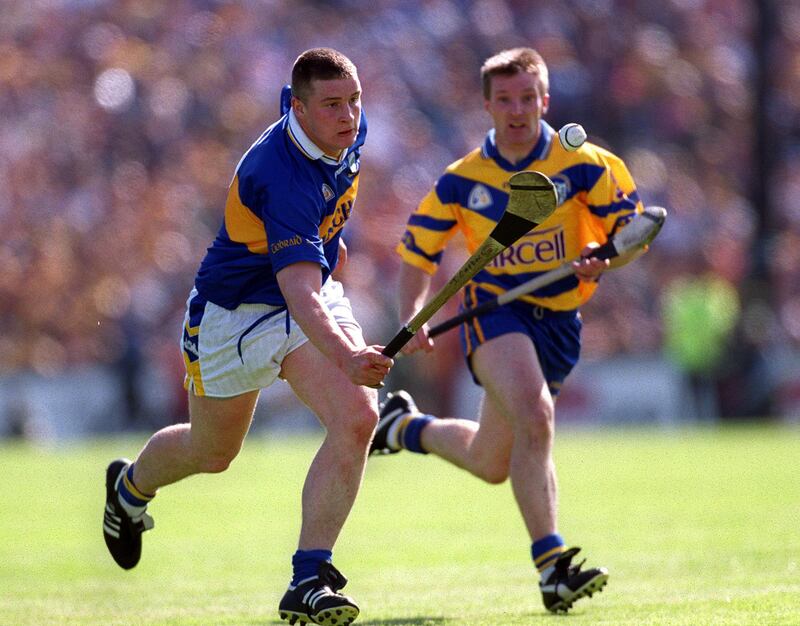 James O'Connor  chases down John Carroll during the 2001 Munster  semi-final. "For us 2001 was one that got away. We had savage work done. We had poured everything into it." Photograph: Patrick Bolger/Inpho