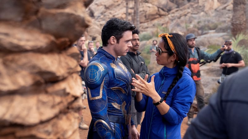 Richard Madden and Chloé Zhao on the set of Eternals