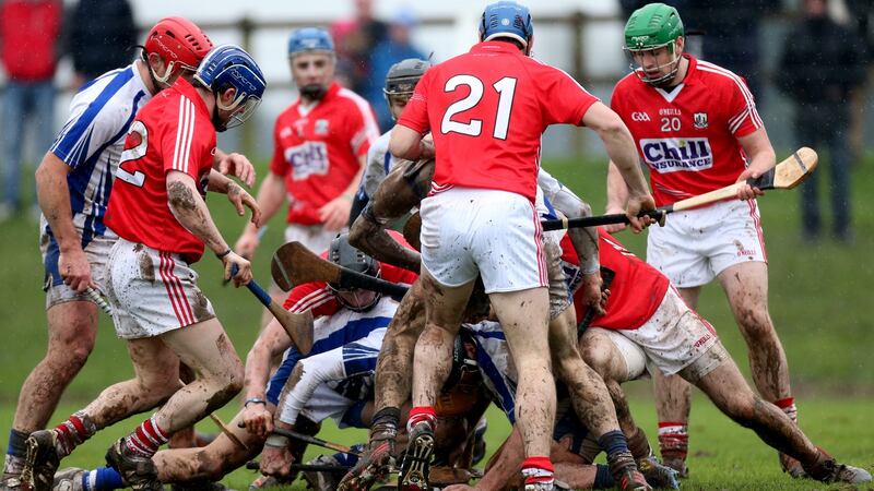 A muddy encounter between Cork and Waterford in 2013. Photograph: James Crombie/Inpho