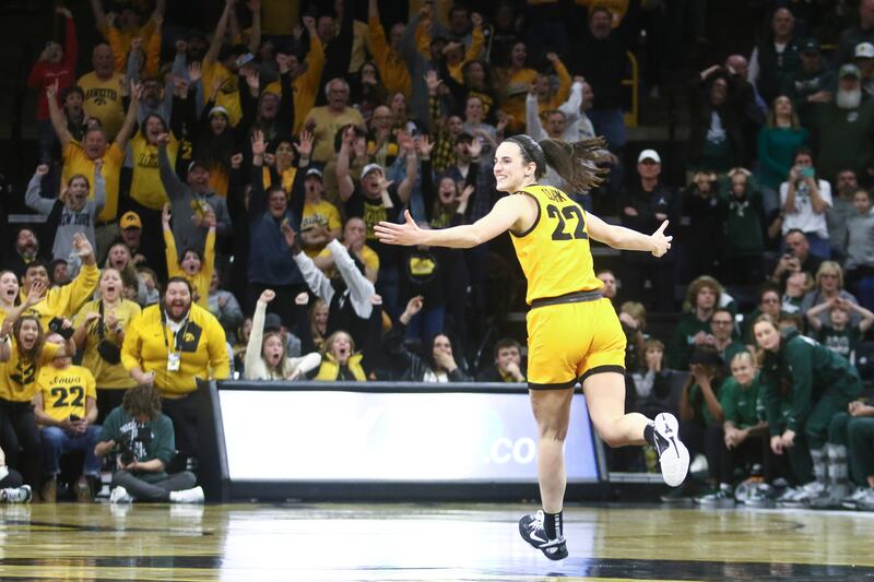 Caitlin Clark of the Iowa Hawkeyes celebrates with home fans after scoring the game-winning shot in the closing seconds against the Michigan State Spartans at Carver-Hawkeye Arena on Januaray 2nd in Iowa City, Iowa. Photograph: Matthew Holst/Getty Images
