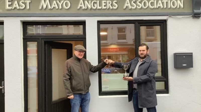 East Mayo Anglers Association  chairman Ben Baynes (left) presenting Paul Kelly with the Swinford Cup for his 15lb salmon caught on spinner in Ryan’s Pool on the  Moy in September