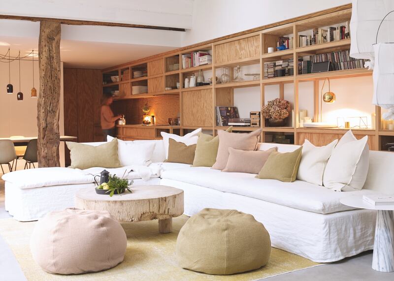 A relaxed linen-covered sofa from Maison de Vacances