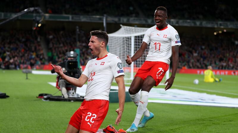 Fabian Schär of Switzerland celebrates his goal. Photograph: Catherine Ivill/Getty Images