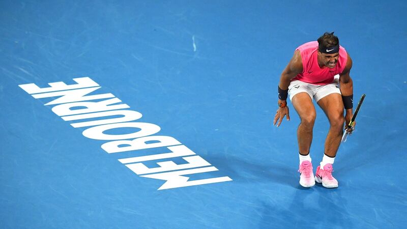Nadal reacts after losing a point. Photo: Lukas Coch/EPA