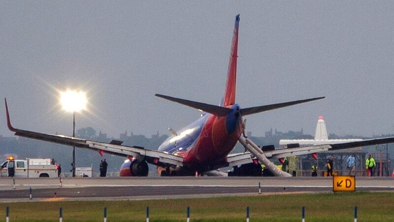Emergency rescue personnel surround a Southwest Airlines Boeing 737 plane as it sits on the tarmac at LaGuardia Airport in New York. Photograph: Reuters