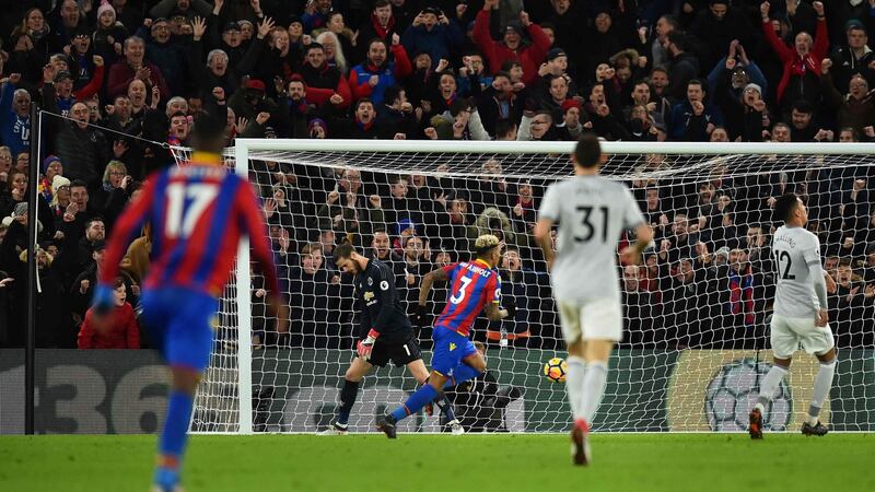 Patrick van Aanholt scores Crystal Palace’s second against Manchester United. Photograph: Glyn Kirk/AFP