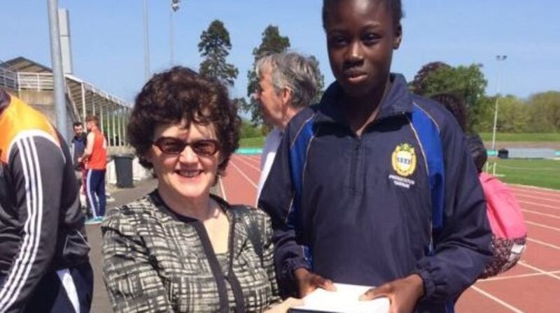 Rhasidat Adeleke receiving  an athlete of the meeting award at a schools event in 2016.