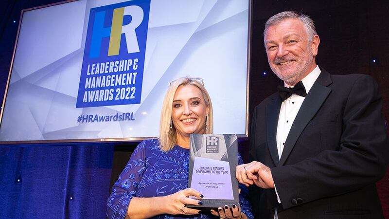 Dr. Sinéad Brennan, awards judge, presents the Graduate Training Programme of the Year award to Steven Thacker, DPD Ireland.