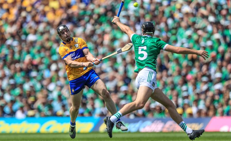 Clare's Tony Kelly with Diarmaid Byrnes of Limerick in action during the Munster SFC final. Photograph: Evan Treacy/Inpho