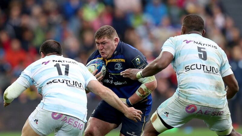 Furlong runs at Vasil Kakovin and Leone Nakarawa. Photo: Billy Stickland/Inpho