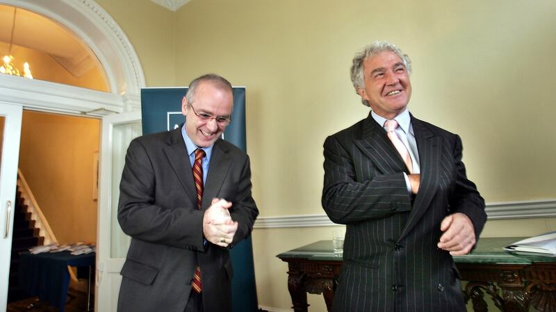 David Drumm (left) with Sean Fitzpatrick former group chief executive of Anglo Irish Bank at the publication of its preliminary results for 2004. Photograph: Brenda Fitzsimon