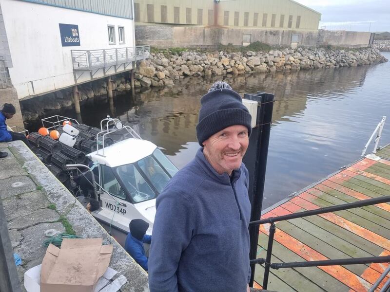 Ciarán Oliver in the Galway Docks. The fisherman had to come out at the height of the storm in the early hours last Monday to secure his boats and prevent them from being thrown on top of the quay. Photograph: Harry McGee