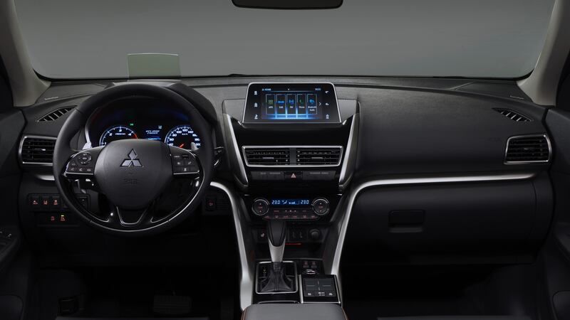 The cabin’s not bad.  The front seats are hugely comfy, and the new touchscreen looks good, sticking up proud of the dash