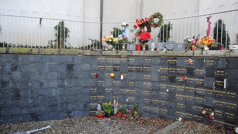 Flowers placed at a Columbarium wall in Mount Jerome Cemetery, Dublin, by people who have stored their relatives’ ashes after cremation. Photograph: Aidan Crawley
