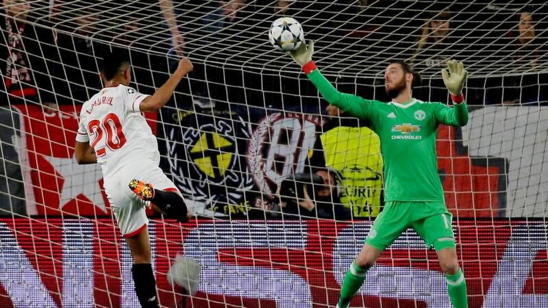 Manchester United’s David De Gea makes a save from Sevilla’s Luis Muriel during the Champions League round of 16 first leg game  at the Sánchez Pizjuán stadium. Photograph: Jon Nazca/Reuters