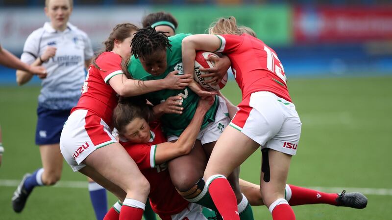 Ireland’s Linda Djougang is tackled by Wales’ Robyn Wilkins and Hannah Jones  during the Women’s  Six Nations match at Cardiff Arms Park. Photograph: Nick Potts/PA Wire