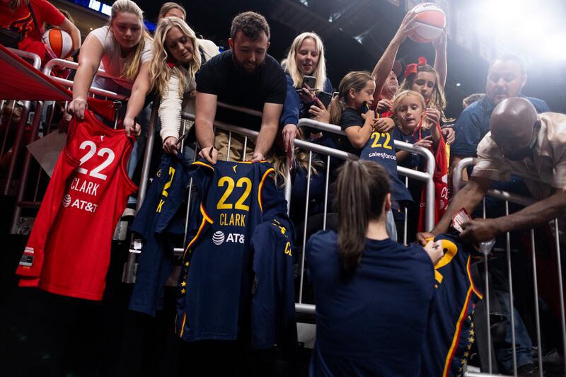 Caitlin Clark of the Indiana Fever signs autographs prior to the game against the Atlanta Dream at Gainbridge Fieldhouse in Indianapolis, Indiana. Photograph: Chet White/Getty Images