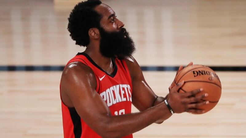 James Harden of the Houston Rockets shoots a free throw during the first half against the Dallas Mavericks. Photograph: Getty Images