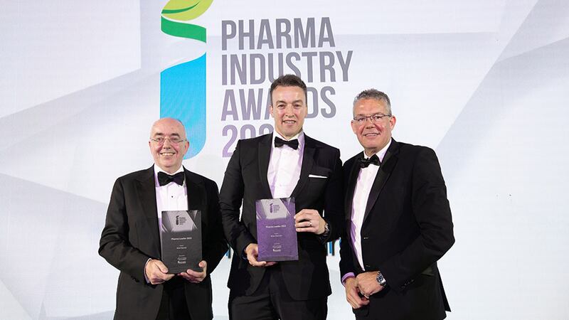 John Comerford, CEO, Asgard Cleanroom Solutions, presents the Pharma Leader 2022 awards to Mark Barrett and Brian Glennon, APC.