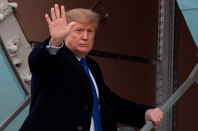 US president Donald Trump waves as he boards Air Force One at Andrews Air Force Base on February 15th Photograph: Jim Watson/AFP/Getty