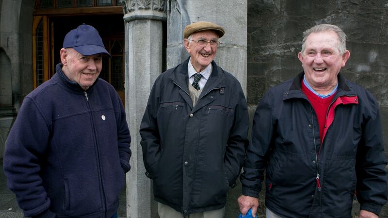 Jonny Brennan, Ger Cowhey and Salvador Slattery after the service. Photograph: Brian Gavin/Press 22