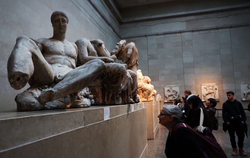 Visitors look at the Parthenon marbles at the British Museum in London, Britain, November 2023. Photograph: Andy Rain/EPA
