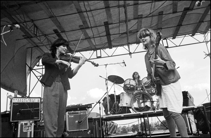 Vicky Aspinall on violin, Palmolive on drums and Gina Birch on bass of The Raincoats performing at Alexandra Palace, London, UK, 16th June 1980. (Photo by David Corio/Redferns)