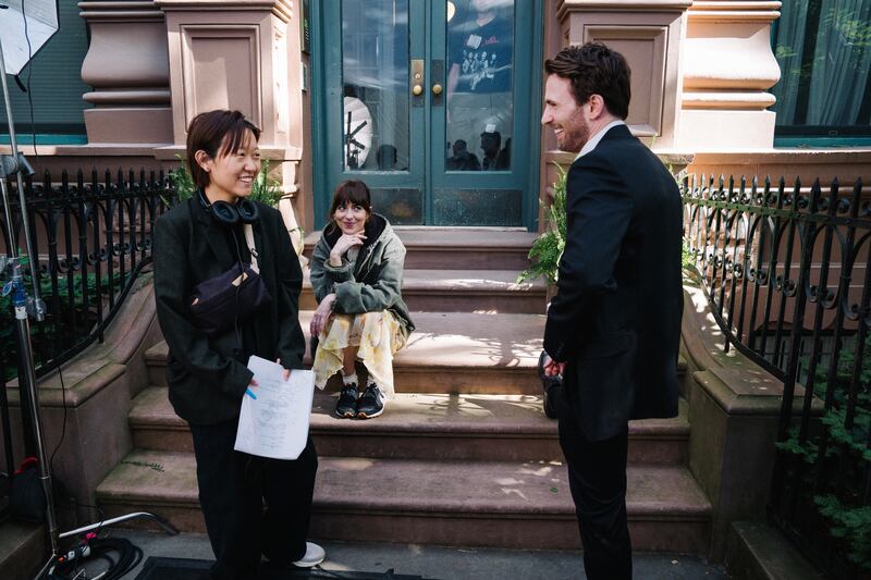Materialists: Celine Song on set with Dakota Johnson and Chris Evans. Photograph: Atsushi Nishijima