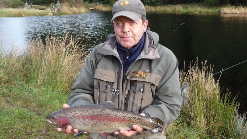 Roger Fowler, winner of Annamoe Trout Fishery winter league, with a good-sized rainbow trout