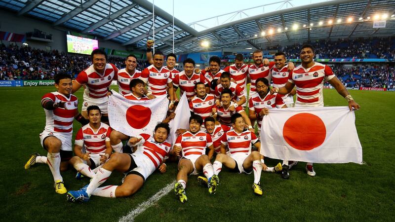 Japan celebrate their win over South Africa in 2015. Photograph: Gareth Fuller/PA