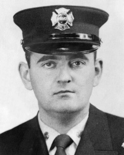 Mel Patrick Lynch in his firefighter’s uniform. Photograph: NYT