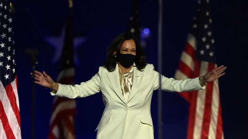 Vice  president-elect Kamala Harris arriving on stage dressed in white. Photograph:  Jim Watson/ AFP/Getty Images