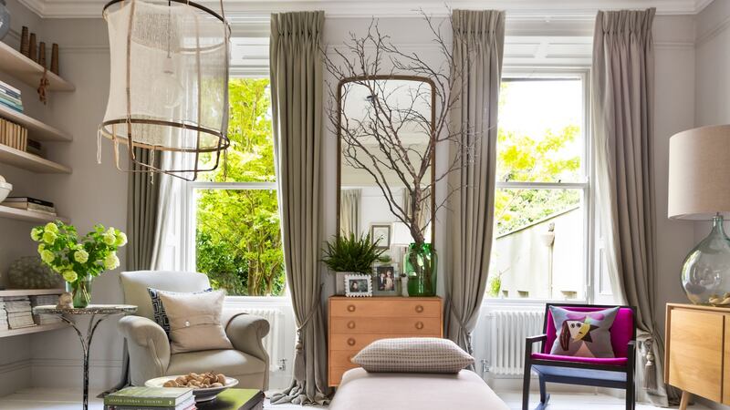 Tall sash windows, calm colours in front reception room