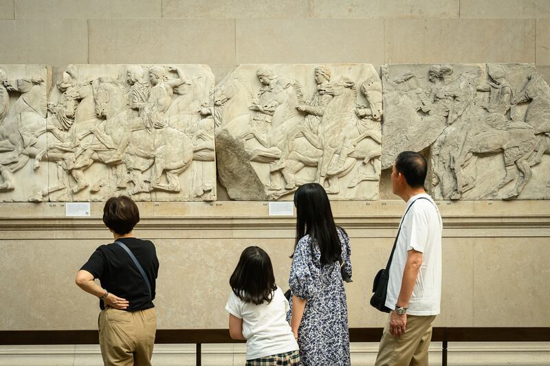 Visitors to the British Museum walk around a selection of items from the collection of ancient Greek sculptures known as the Parthenon Marbles in August 2023 in London, England. Photograph: Leon Neal/Getty