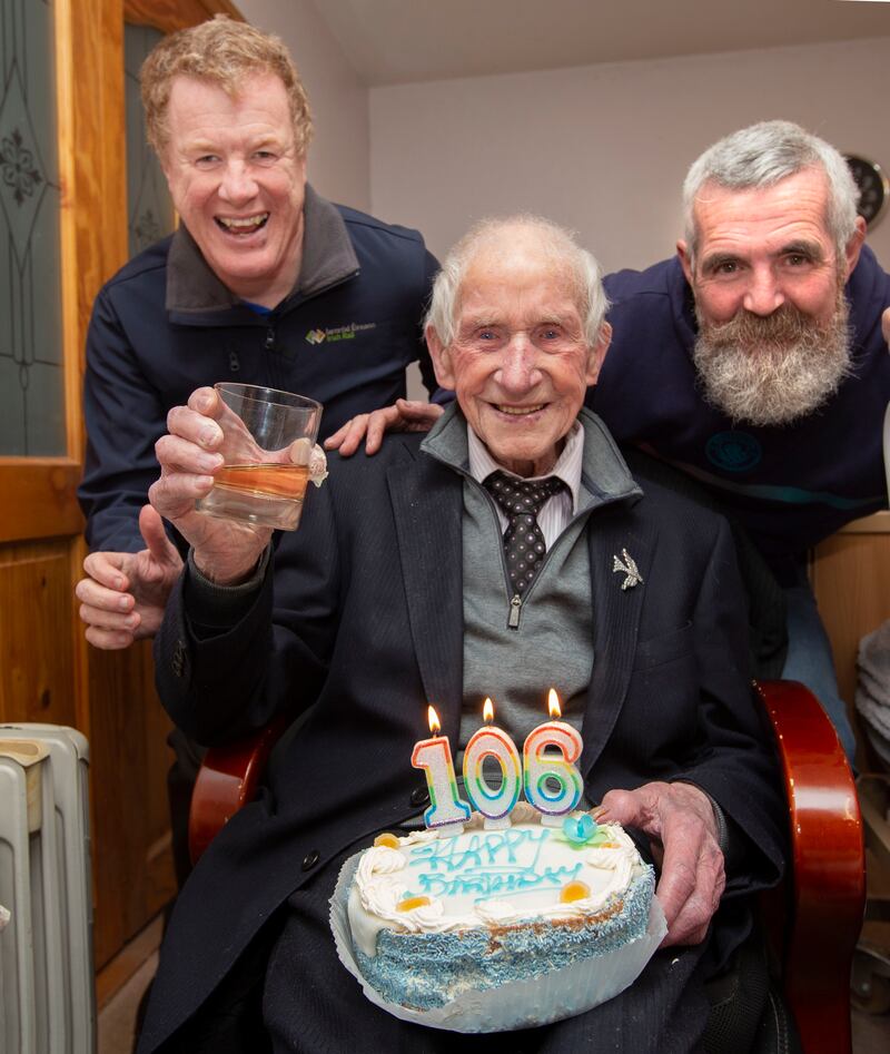 Micheal Coyne raises a glass of Jameson to celebrate his birthday with nephew Neil McGarry (left) and godson Austin Waldron. Photograph: Brian Farrell

