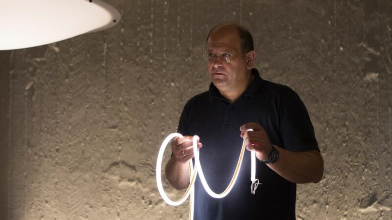 Nikos Vasiliou, owner of Bright Special Lighting,  in Lykovrisi, a suburb of Athens. Vasiliou said he turned a profit last year for the first time since the debt crisis. Photograph: Eirini Vourloumis/The New York Times