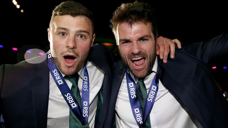 Ireland’s Robbie Henshaw and Jared Payne celebrate their Grand Slam victory in the 2015 Six Nations. Photograph:  Dan Sheridan/Inpho