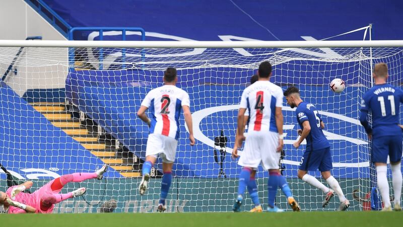 Jorginho scores the first of his two penalties against Crystal Palace. Photograph: Neil Hall/EPA