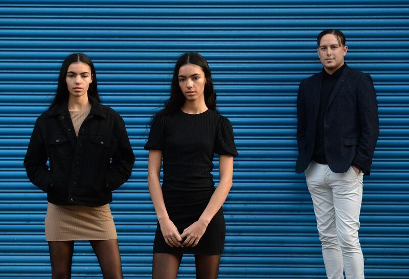 Sadhbh and Cadhla O’Reilly with Colin Burke. Photograph: Dara Mac Dónaill