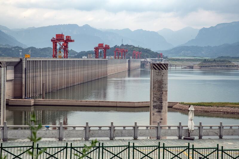 The Three Gorges Dam and low water levels along the Yangtze river in Yichang, China. Photograph: Bloomberg