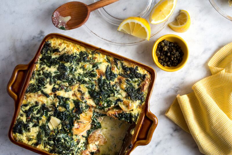 Yotam Ottolenghi’s salmon: creamy potato gratin with smoked and fresh salmon. Photograph: Andrew Scrivani/NYT