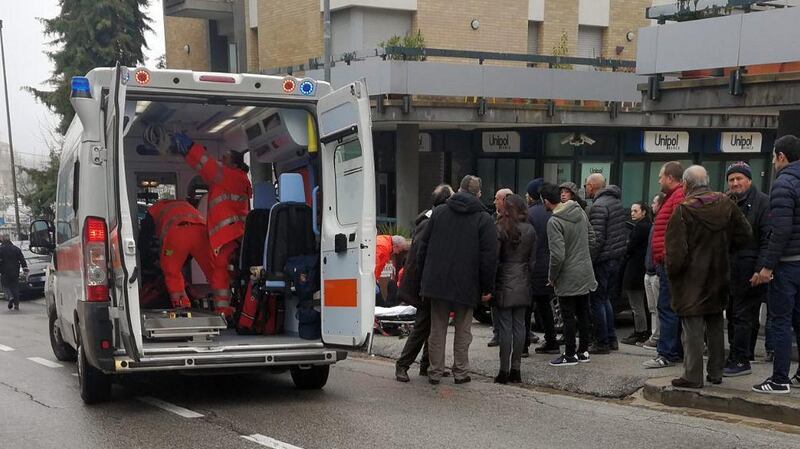 Paramedics attend a wounded man after a shooting broke out in Macerata, Italy, Saturday, February 3rd, 2018. Photograph: Guido Picchio/ANSA