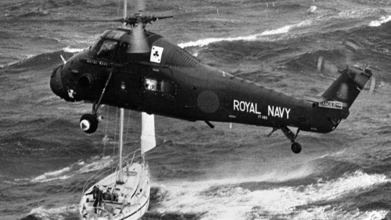 A Royal Navy helicopter hovers over the stricken yacht Camargue, ready to winch up the last of eight crew members in the wake of the Fastnet race disaster on August 15th, 1979. File photograph: PA Wire