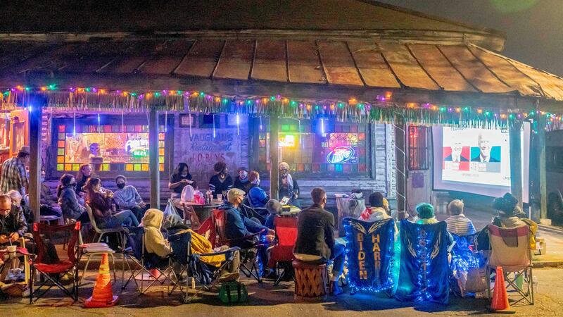Neighbours watch election results from Vaughan’s Lounge in New Orleans, Louisiana, on Tuesday night.  Photograph: Emily Kask/AFP/AFP/Getty