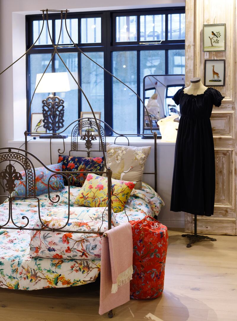 Antique French bed displaying wool pillow and bedlinen at Amo & Pax. Photograph: Kieran Harnett