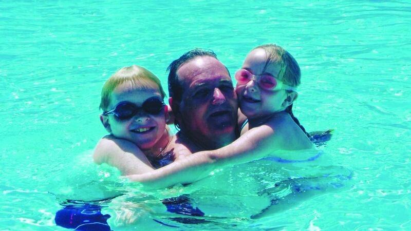 Paddy Armstrong and “my babies, John and Sophie” on their first family holiday in 2004. “Who would have thought this could ever happen? Certainly not me!” he writes in his autobiography