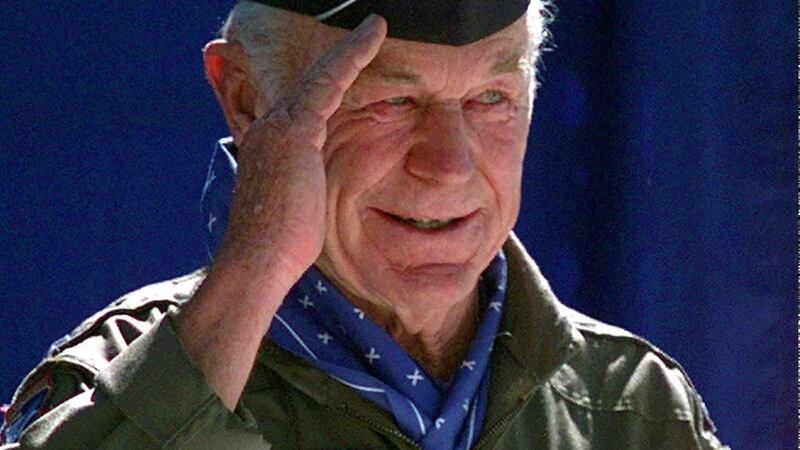 Chuck Yeager salutes the crowd at Edwards Air Force Base, California, 1997, after flying in a F-15D jet fighter plane, breaking the sound barrier once again during the 50th anniversary of supersonic flight. Photograph: Michael Caulfield/AP Photo