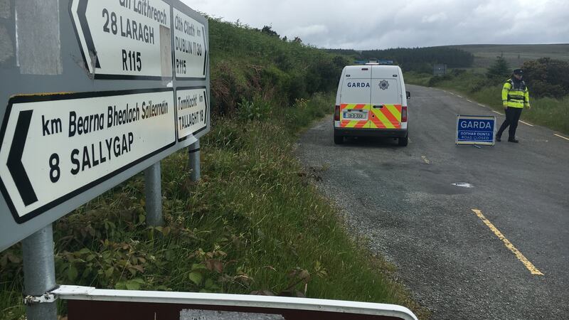 The scene at Glencree, with a Garda road block on the Military Road. Photograph: Cyril Byrne
