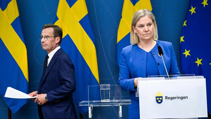 Sweden’s prime minister Magdalena Andersson (right) and the Moderate Party’s leader Ulf Kristersson arrive to address a news conference in Stockholm on Monday. Photograph: Henrik Montgomery/TT News Agency/AFP via Getty